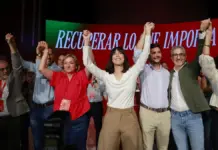 Diana Morant y Arcadi España en la clausura de una conferencia del PSPV-PSOE