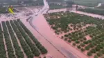 Zona inundada en Pego, con reconocimiento de vehículos por GEAS y servicio aéreo tras la crecida de barrancos